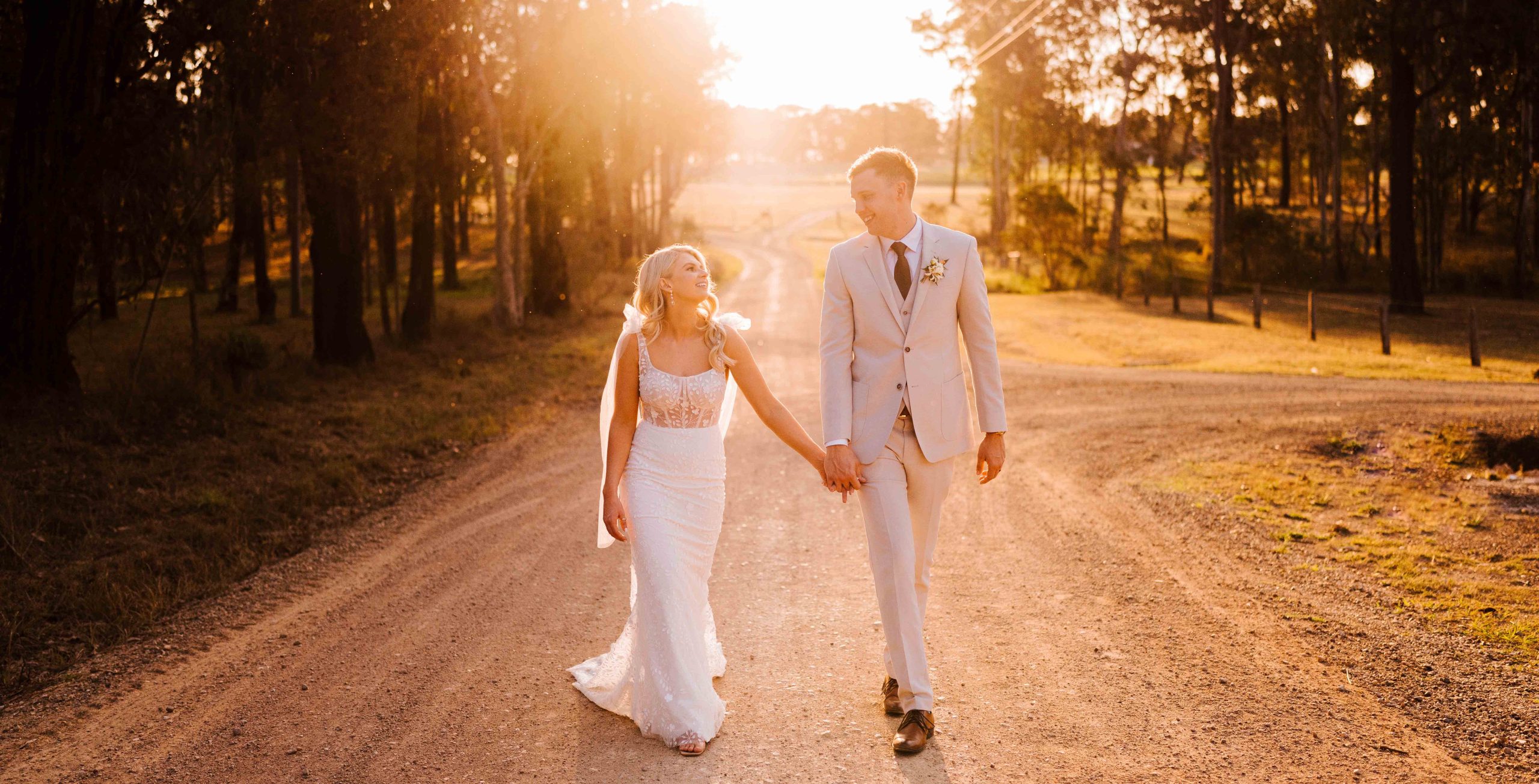 married couple in sunset light at Enzo Weddings by photographer Gez Xavier Mansfield